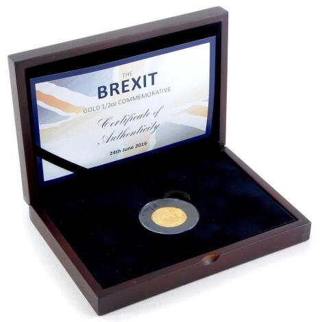 A Brexit gold ½oz commemorative coin for 2016, 24ct gold, number 16 of 95, in box with certificate.