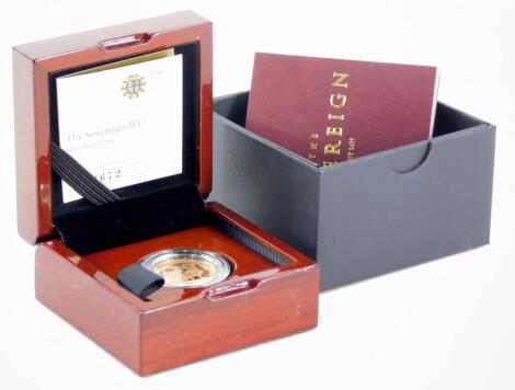 A 2017 gold proof sovereign, with certificate and box.