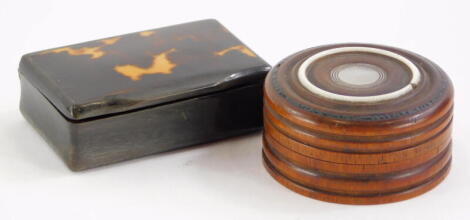 A 19thC horn and tortoiseshell rectangular snuff box, 5cm long, and a small 19thC turned hardwood treen box, containing mother of pearl gaming counters, (2).