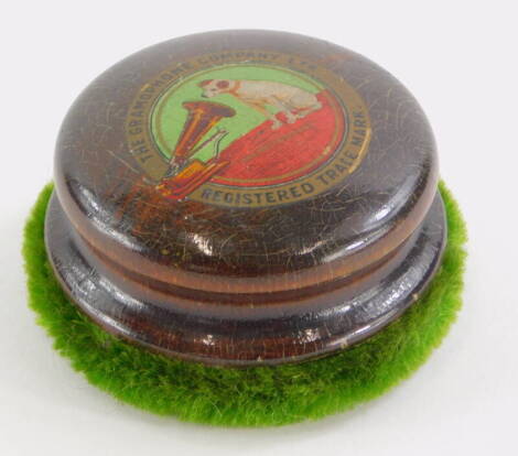 A HMV turned wood and felt record cleaner, 7cm diameter.