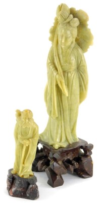 A green Chinese soapstone figure of a lady, possibly Guan Yin, 21cm high, and another figure, (2).