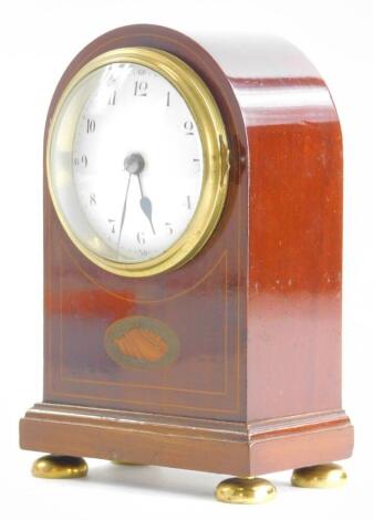 An Edwardian mahogany and inlaid miniature bracket clock, with a French enamel dial, on bun feet, 15cm high.