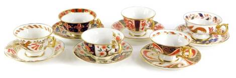 Five various Royal Crown Derby cups and saucers of varying patterns, and a single Royal Crown Derby cup (6).