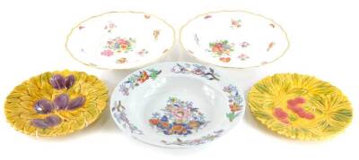 A collection of ceramics, to include a pair of German porcelain soup plates, each painted with flowers, on a moulded group with gilt border, indistinct marks in blue to underside, 23.5cm diameter, a Davenport soup plate, and a pair of Sarreguemines desser