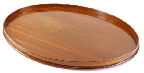 A late 19th/early 20thC mahogany oval galleried tray, 68cm x 52cm.