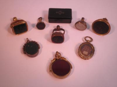 A gilt metal and bloodstone seal initialled DHW inset in bloodstone and orange agate