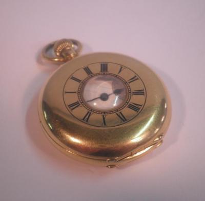 A 19thC 18ct gold mid size half hunter pocket watch