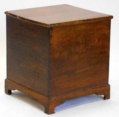 A 19thC mahogany box, the hinged lid enclosing a vacant interior, on bracket feet, 48cm high, 43cm wide.