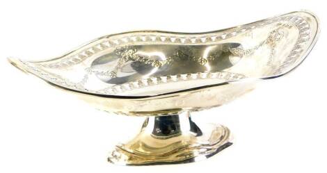 A George V silver bowl or centrepiece, with shaped sides, pierced borders, engraved with swags, ribbons, etc., Birmingham 1933, 17oz, 30cm wide.