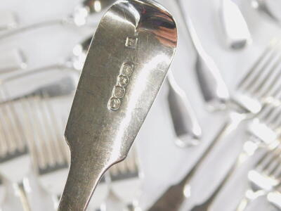 An associated set of early 19thC silver fiddle pattern cutlery, a set of twelve dessert forks, London 1836, maker J H over AH and three associated dessert forks by Joseph and Albert Savory, (15) a set of twelve table forks, London 1834, maker J H over AH, - 2