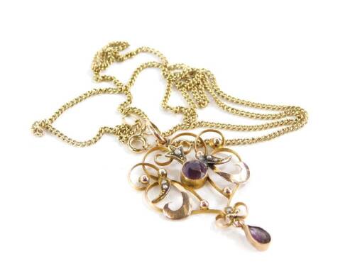 An Art Nouveau pendant and chain, the Art Nouveau pendant set with central amethyst and seed pearls, yellow metal stamped 9ct, 4cm high, on a later 9ct gold fine curb link chain, 45cm long, 5.7g all in.