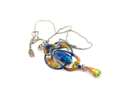 An Art Nouveau style enamel pendant, with blue, orange, green and yellow coloured enamels, on a white metal back stamped silver, on a fine link chain, the pendant 7cm high, on jewellery stand.