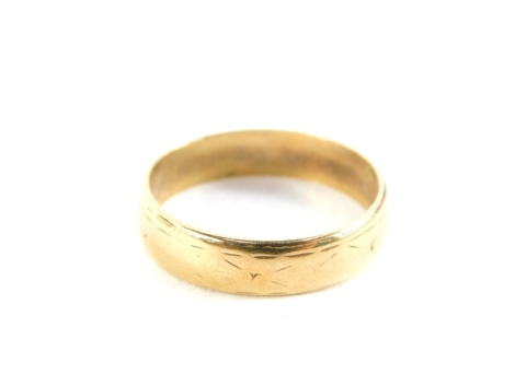 A 22ct gold wedding band, 3.6g.