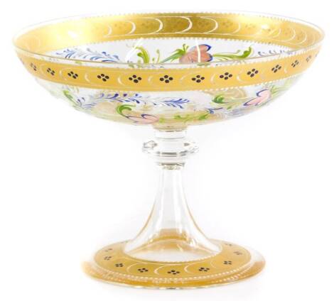 A Venetian glass tazza or stand, with enamel decoration of flowers, leaves, within gilt borders, signed to base Decorato A.Marc, Murano oro 24 K.FT, 19cm diameter.