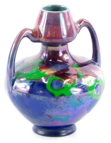 A Shelley Walter Slater lustre vase, of Art Nouveau style decorated in pink, purple, blue, green and red, printed marks in black to underside, 10cm high.