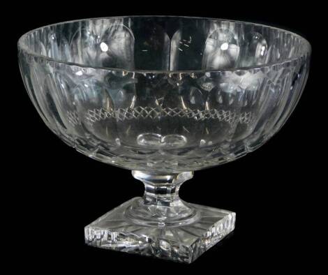 A cut glass bowl, with fluted and hobnail cut decoration, on a square foot, 29cm diameter.