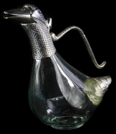 A duck shaped glass claret jug, with plated mounts, 23cm high.