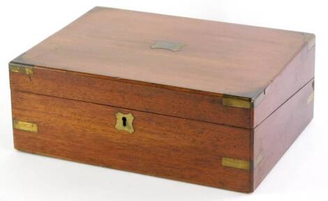 A mahogany and brass bound writing box, the interior with a felt lined slope, 30cm wide.