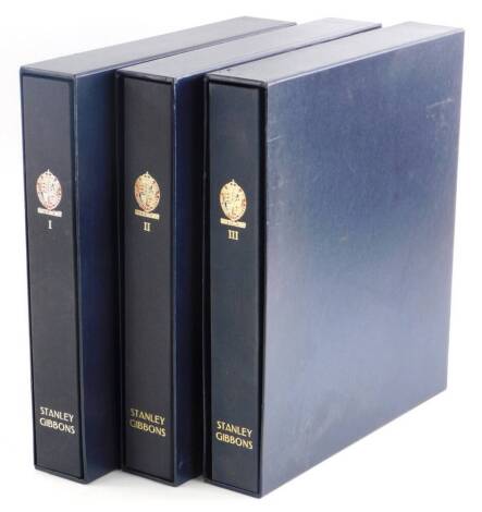 Three Stanley Gibbons stamp albums, containing a collection of world and British stamps, etc. Auctioneer announce there are only GB stamps in these three albums.