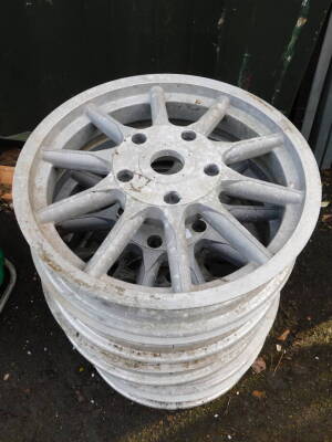 Five unnamed ten spoke alloy wheels, 21 1/2" diameter. - 2