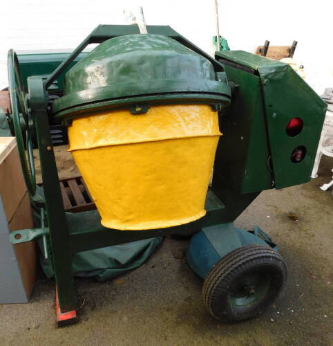 A Baromix of Alcester cement mixer, with a Villiers 4 stroke engine, Mk SC12.02.14., No 42878, with instructions.