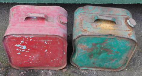 Two vintage Robbican oil cans, one in red, the other green.