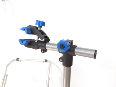 A Crivit Sports bicycle repair stand, FN-1290., a bike tree, and a bike rack. (3) - 3