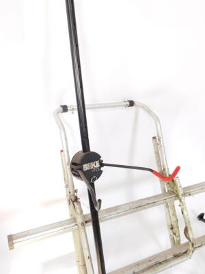 A Crivit Sports bicycle repair stand, FN-1290., a bike tree, and a bike rack. (3) - 4