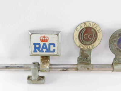 A car badge bar holding five badges, for RAC., Caravan Club., Lion's International., British Caravanner's Club., and The Camping Club. - 3