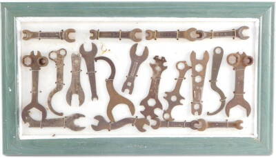 Motorcycle and automobile spanners, for BSA, Regent, Austin, framed, together with hand tools.