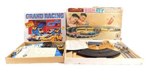 A Lincoln International High-Rev battery operated slot racing set, with revving motor roar, set no 2, together with a Hong Kong battery operated Grand Racing set, no 7642/PLBW, both boxed. (2)