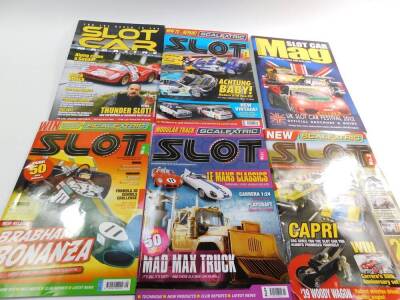 Scalextric Club Magazines, and further ephemera, in a Scalextric box. - 2