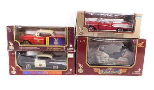 Three Road Legends die cast vehicles, comprising a Bel Air Police Chief Chevrolet 1957, scale 1:18., Bel Air Fire Chief 1957., and a Honda Goldwing Motorcycle, scale 1:10., together with a Road Signature die cast model of an Edsel Citation 1958, scale 1:1