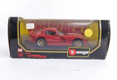 Three Burago die cast cars, 1:24 scale, comprising Dodge Viper GTS Coupe (1997)., Chevrolet Corvette (1957)., and a Mercedes Benz SSK1928, all boxed. - 3