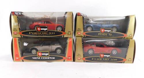 Four Burago Bijoux Collection die cast cars, 1:24 scale, comprising Mini Cooper., Porsche 911 Carrera (1997)., BMW M Roadster (1996)., and Ferrari 550 Maranello (1996), all boxed.