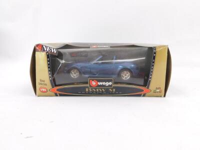 Four Burago Bijoux Collection die cast cars, 1:24 scale, comprising Mini Cooper., Porsche 911 Carrera (1997)., BMW M Roadster (1996)., and Ferrari 550 Maranello (1996), all boxed. - 4