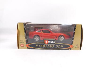 Four Burago Bijoux Collection die cast cars, 1:24 scale, comprising Mini Cooper., Porsche 911 Carrera (1997)., BMW M Roadster (1996)., and Ferrari 550 Maranello (1996), all boxed. - 5