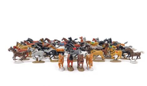 Various 20thC lead cavalry horses, bearing colours to include a white prancing example, 5cm H, others in grey, brown, etc. (qty)