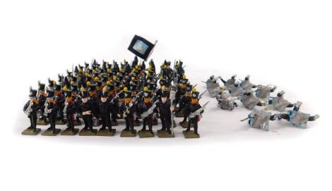 Various 20thC lead soldiers, to include some in black holding rifles, 3.5cm H, other regiments, etc. (qty)