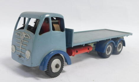 A Shackleton Mechanical Foden flat bed truck, in grey with blue guards.