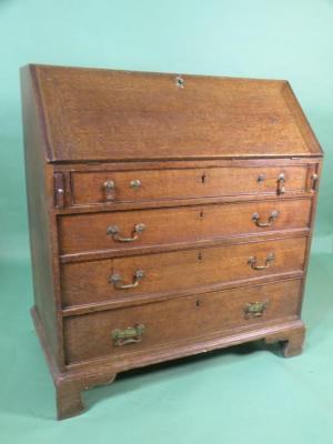 A George III oak bureau