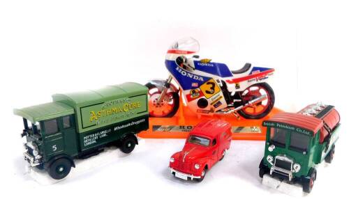 Two Corgi die cast AEC 508 forward control cab-overs, British Petroleum Company Ltd., and Potter's Asthma Cure., Matchbox die cast vintage truck., Brooke Bond Tea., and a Tuitoy model of a Honda motorbike Freddie GP, Ref 13143, all boxed. (4)