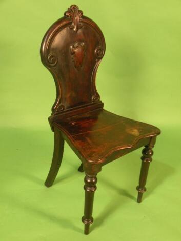 An early Victorian mahogany hall chair