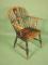 A mid 19thC ash and elm Windsor armchair