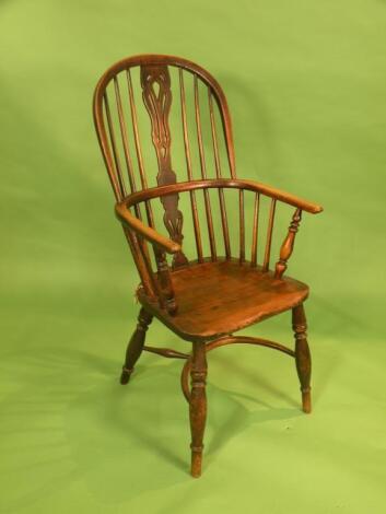 A mid 19thC ash and elm Windsor open armchair