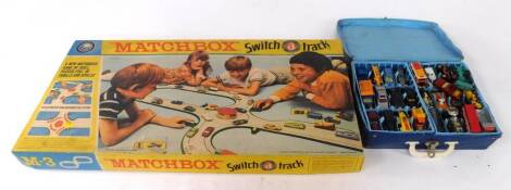 A Matchbox Switch A Track set, M-3, together with a carry case with Matchbox and other die cast vehicles. (a quantity)