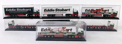 Seven Oxford die cast Eddie Stobart lorries, five with containers, cased.