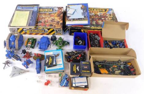 Warhammer, including armored vehicles, figures, cards and accessories. (a quantity)