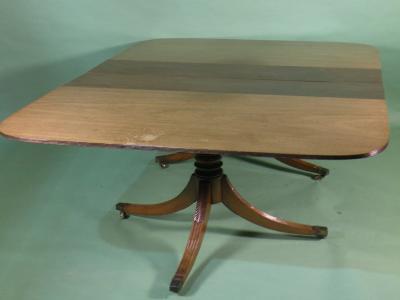 A Regency mahogany extending dining table