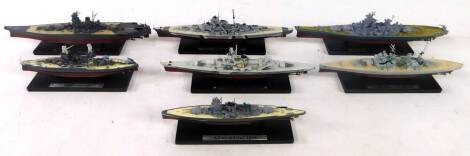 Seven scale models of battleships, on stands, with blister packs, comprising Admiral Graf Spee., USS Arizona., Scharnhorst., HMS Prince of Wales., I J N Yamato., Bismarck and USS Missouri.